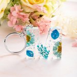 Portachiavi a forma di lettera in resina Flowers