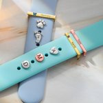 Klocktillbehör med tryck för klockarmband