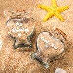 Cadeau de mariage : bocal de sable pour lune de miel en verre avec un cœur personnalisé.