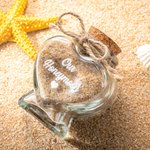 Cadeau de mariage : bocal de sable pour lune de miel en verre avec un cœur personnalisé.