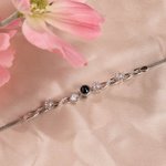 Bracciale personalizzato in argento sterling con proiezione interna di foto di fiori e ti amo in 100 lingue