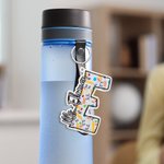 Portachiavi in acrilico personalizzato con iniziale e nome, stile matita di Graffiti.