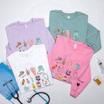 Personalized Multicolor Medical Instrument Pattern Design T-Shirt Sweatshirt with Text Nurse Graduation Birthday Gift for Nurse Doctor