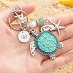 Personalized Sea Turtle Starfish Ocean Theme Keychain Bag Charm with Engraved Initial Disc and Turquoise Pearl Birthday Gift for Women Turtle Lovers