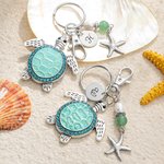 Personalized Sea Turtle Starfish Ocean Theme Keychain Bag Charm with Engraved Initial Disc and Turquoise Pearl Birthday Gift for Women Turtle Lovers