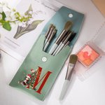 Personalizada de dibujos animados Árbol de Navidad Inicial bolsa de pinceles de maquillaje con 8 piezas de pinceles de maquillaje y el nombre de Navid