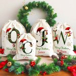 Personalised Bell Holly Santa Hat Initial Drawstring Canvas Gift Bag with Name and Text Christmas Party Gift for Family Kids
