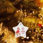 Décorations de lapin Pentagram dans le sapin de Noël pour le premier Noël de bébé.