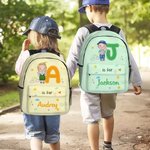 Henkilökohtainen sarjakuvahahmo Initial Large Kid reppu nimi ja sivutaskut takaisin kouluun syntymäpäivälahja pojille tytöille