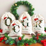 Un sacco pieno di amore (e regali) - Sacco di Babbo Natale in tela personalizzato con iniziale e nom