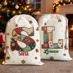 Sacco di tela personalizzato con iniziale e nome design natalizio fiocco di neve bomboniere per vigilia di Natale regalo per bambini 1
