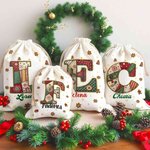 Sacco di tela personalizzato con iniziale e nome design natalizio fiocco di neve bomboniere per vigilia di Natale regalo per bambini 2