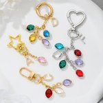Spersonalizowany brelok do kluczy Birthstone Heart Star z brokatowym inicjałem Prezent urodzinowy dla przyjaciela i rodziny