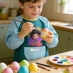 Personalizzazione del personaggio dei cartoni animati con motivo a macchie di vernice impermeabile e grembiule a maniche lunghe con nome e tasca Regalo di compleanno per bambini