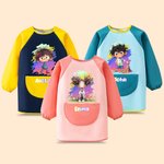 Personalizzazione del personaggio dei cartoni animati con motivo a macchie di vernice impermeabile e grembiule a maniche lunghe con nome e tasca Regalo di compleanno per bambini