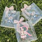 Personalisierte Aquarell Hase Handheld Bouquet Initial klar Geschenk Tasche mit Namen und rosa Schleife Band Ostereierjagd Party Geschenk für Kinder