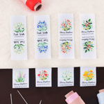Fleur de naissance aquarelle personnalisée 100% coton Etiquette de couture avec nom et texte Cadeau d'anniversaire pour les amateurs de tricot et de bricolage