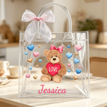 Personlig gavepose i gjennomsiktig plast med rosa og blå sløyfe og hjertebamse, med navn – gave til bursdag eller jubileum for klassekamerat eller barn