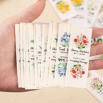 Gepersonaliseerde katoenen naailabels met aquarel geboortebloem naam en tekst set van 50 - verjaardagscadeau voor brei- en haak- en naailiefhebbers