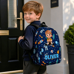 Sac à dos personnalisé avec personnage de dessin animé : licorne fantastique et dinosaure, avec prénom. Pour un usage quotidien, la rentrée scolaire ou comme cadeau d'anniversaire pour filles, garçons