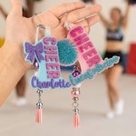 Personalized Glitter Bow Ribbon Cheering Horns Charm Keychain with Name and Tassel Sports Team Birthday Gift for Cheerleader