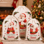 Borsa regalo personalizzata in tela con Babbo Natale e il messaggio “Buon Natale”, con nome e iniziale: regalo della vigilia di Natale per i bambini