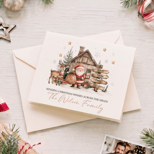 Gepersonaliseerde wenskaart met aquarelafbeelding van de Kerstman en rendieren, met 1 tot 9 namen, tekst en familienaam – kerst- en nieuwjaarscadeau voor familie en vrienden