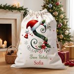 Un sacco pieno di amore (e regali) - Sacco di Babbo Natale in tela personalizzato con iniziale e nome